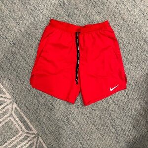 Women’s Nike red running shorts